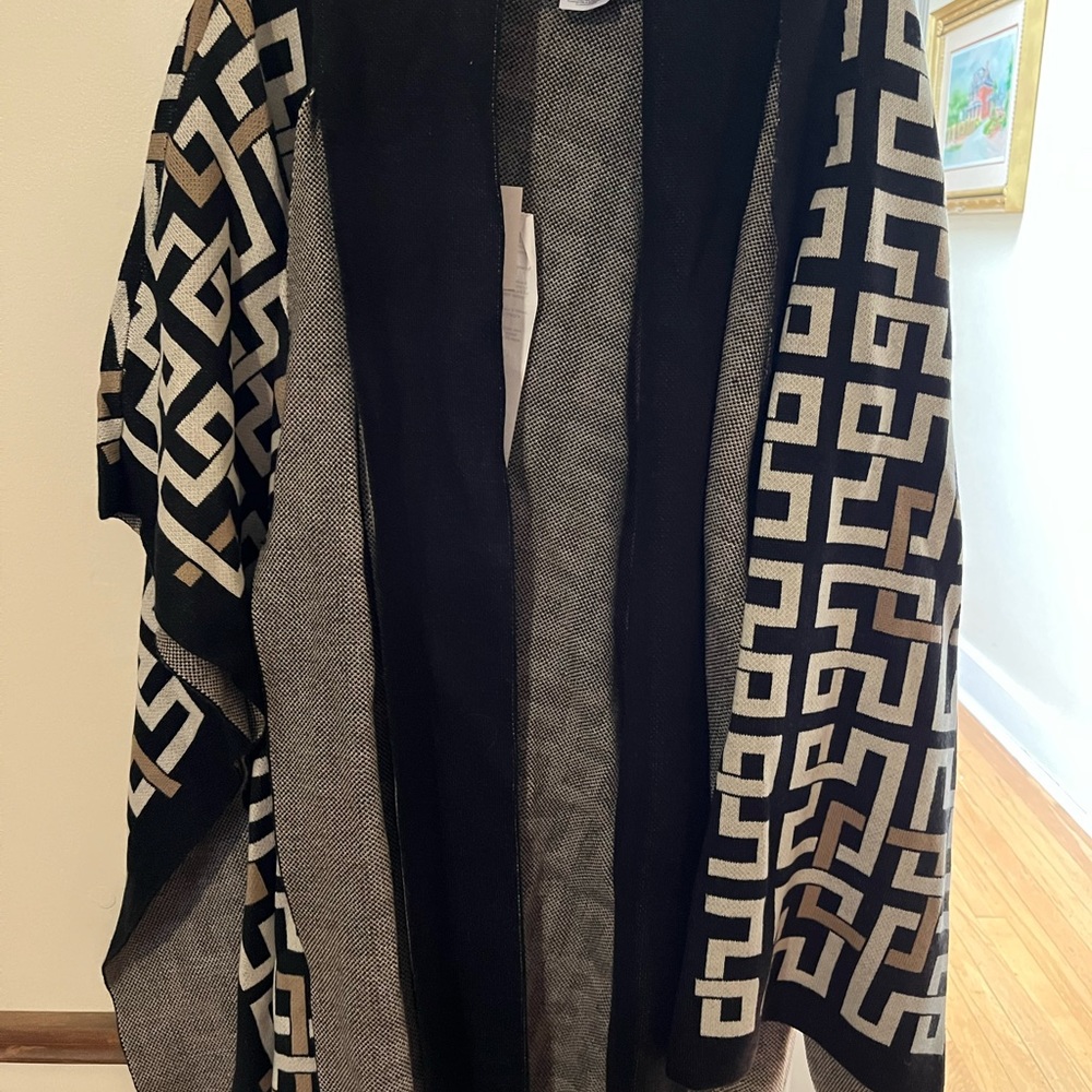 Gorgeous poncho, new with tags.